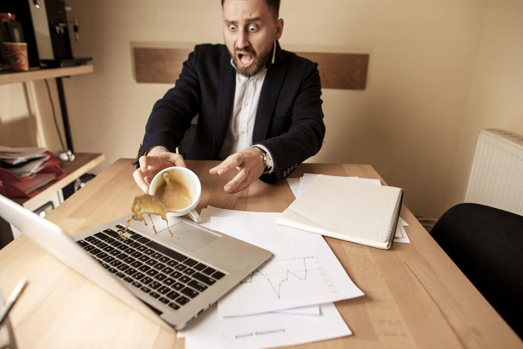 café renversé sur pc portable - dépannage à Lyon